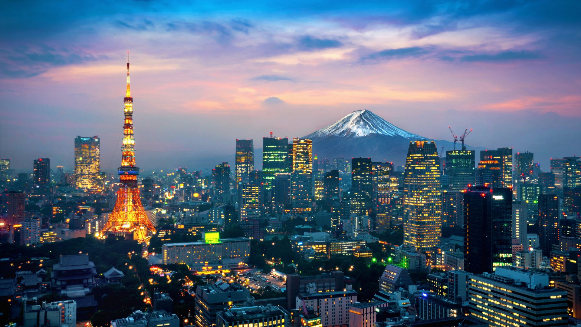 Tokyo skyline with Tokyo Tower and Mt. Fuji at dusk